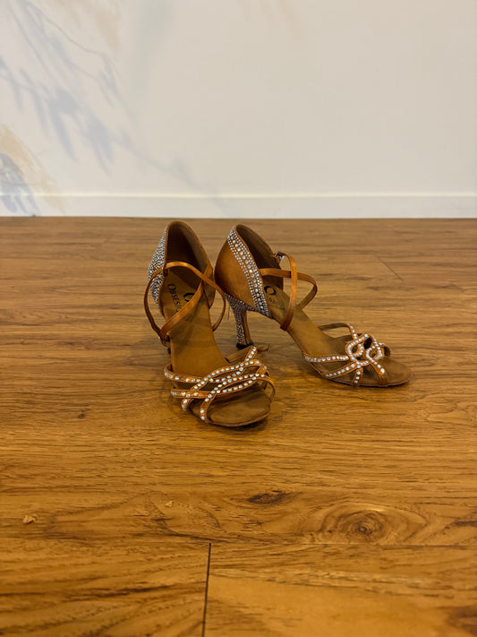 #83 Obsession Tan Sparkle